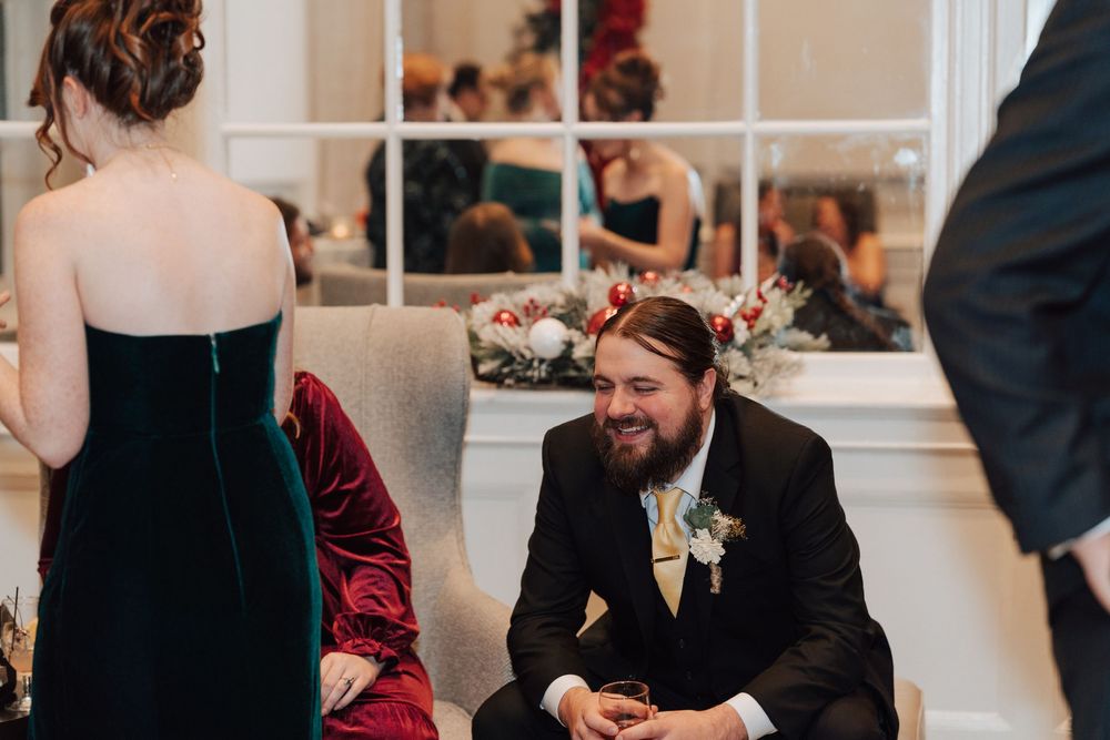 Yorktowne Hotel wedding in York, PA – candid photos of guests during cocktail hour – elegant winter wedding