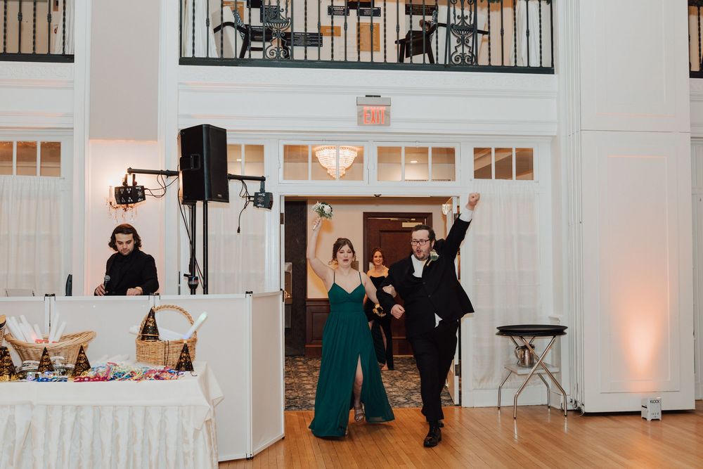 Yorktowne Hotel wedding in York, PA – candid photos bridesmaid and groomsmen during wedding reception for elegant winter wedding