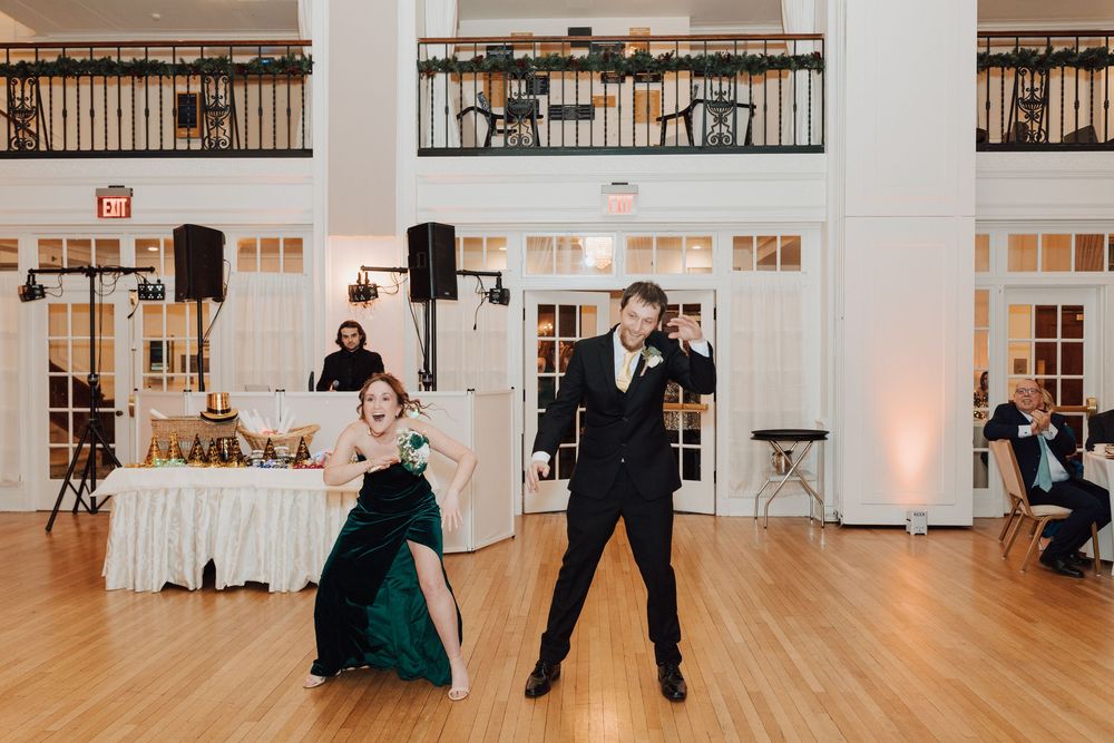 Yorktowne Hotel wedding in York, PA – candid photos bridesmaid and groomsmen during wedding reception for elegant winter wedding