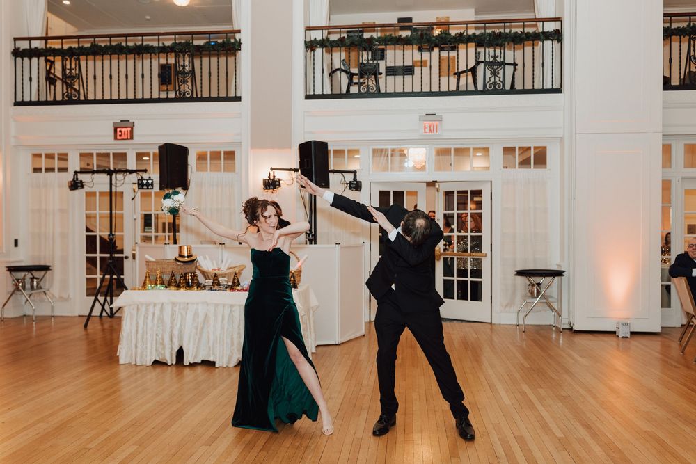 Yorktowne Hotel wedding in York, PA – candid photos bridesmaid and groomsmen during wedding reception for elegant winter wedding