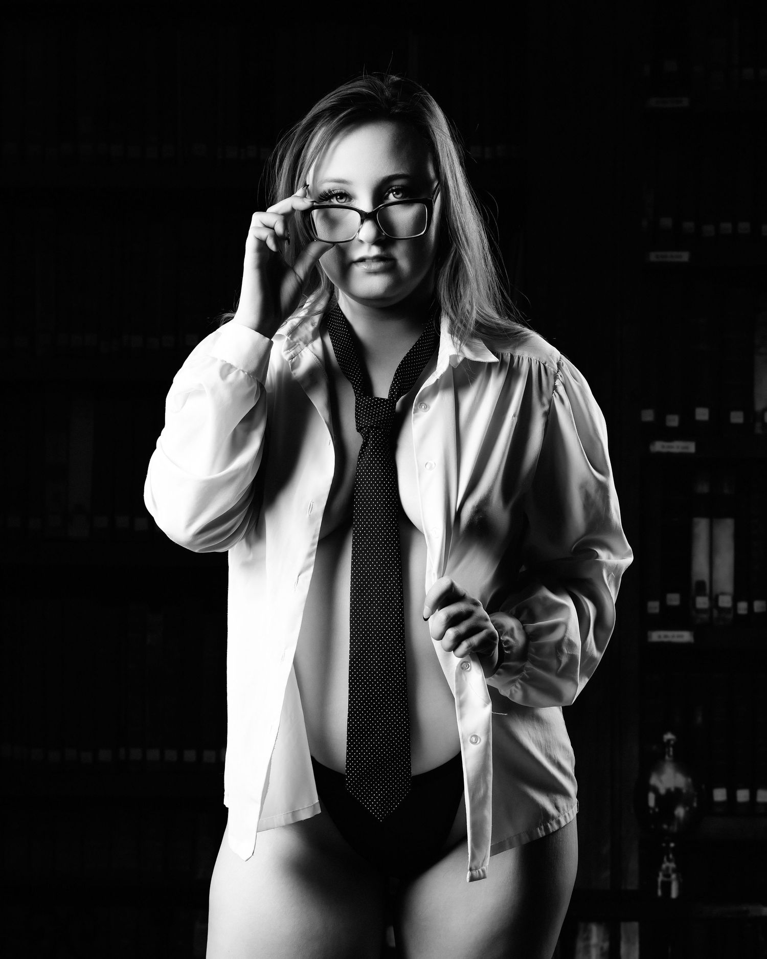 David G Holt Photography - Dramatic black and white portrait series featuring white shirt and tie against dark background.