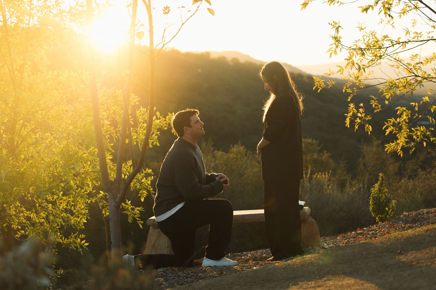 Golden hour proposal at Meditation Mount in Ojai with a couple surrounded by warm sunset light