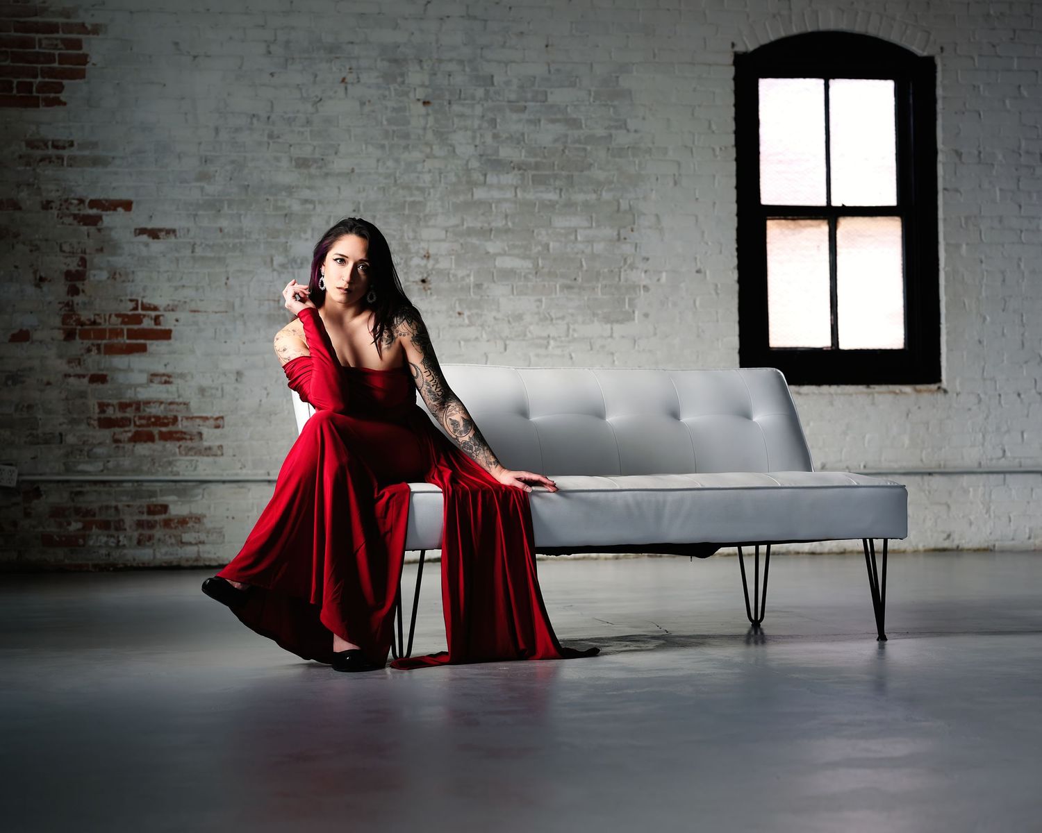 David G Holt Photography - Fashion portrait series featuring woman in red dress posing in industrial space.