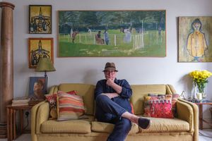 A series of connected photos showing someone reclining on a couch in various positions throughout the day.