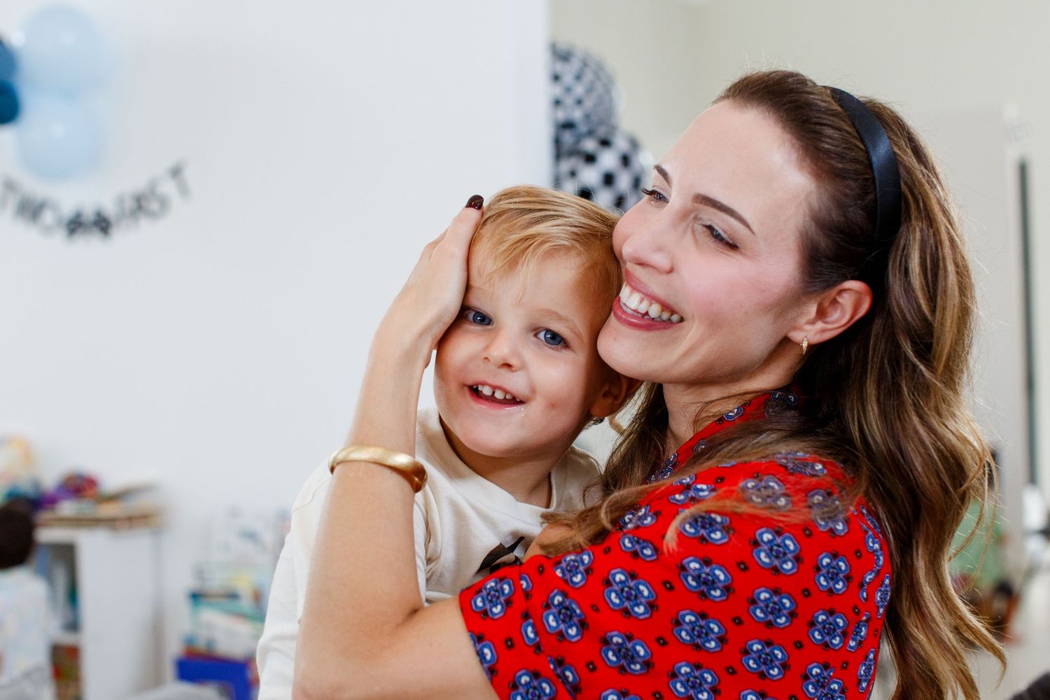 Mother with her two-year-old son on his birthday.