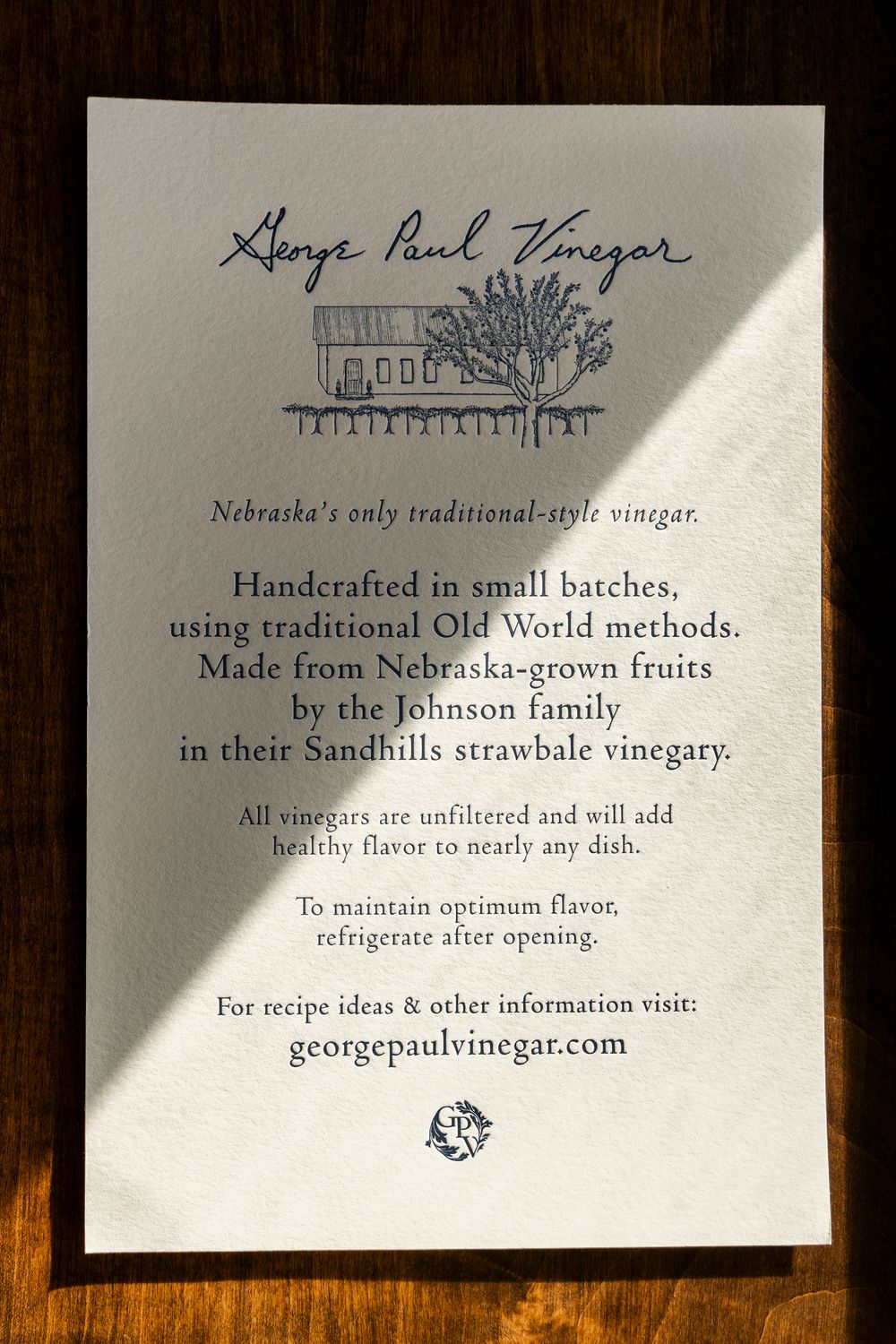 Artistic branding and text details for George Paul Vinegar showcasing traditional craft vinegar making methods.