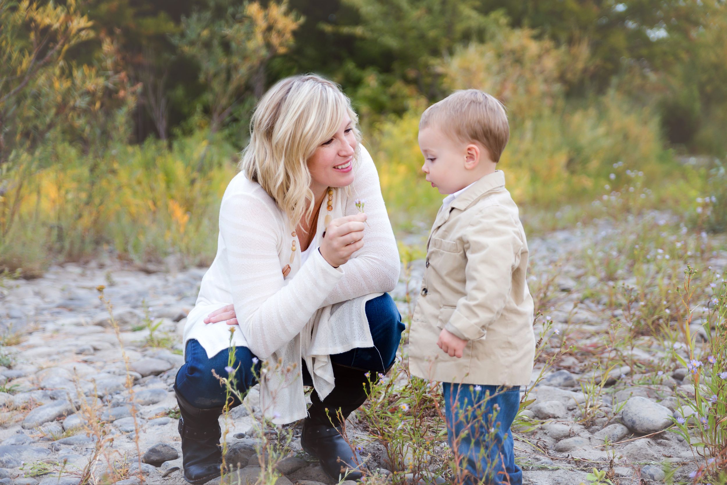 Sweet family moments captured in autumn outdoor setting.