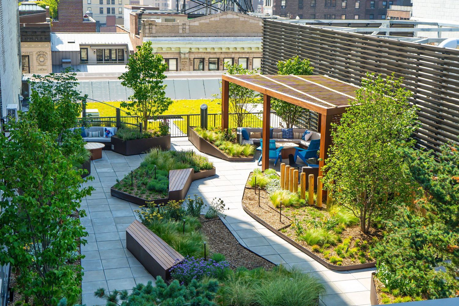 Rooftop garden terrace with urban landscaping and seating areas.