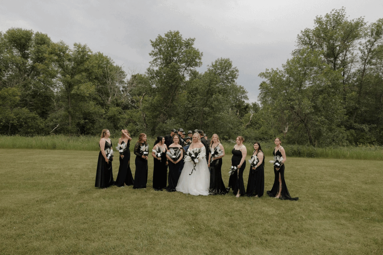 Wedding party lifting groom into the air during celebration in Garrison North Dakota wedding photography GIF