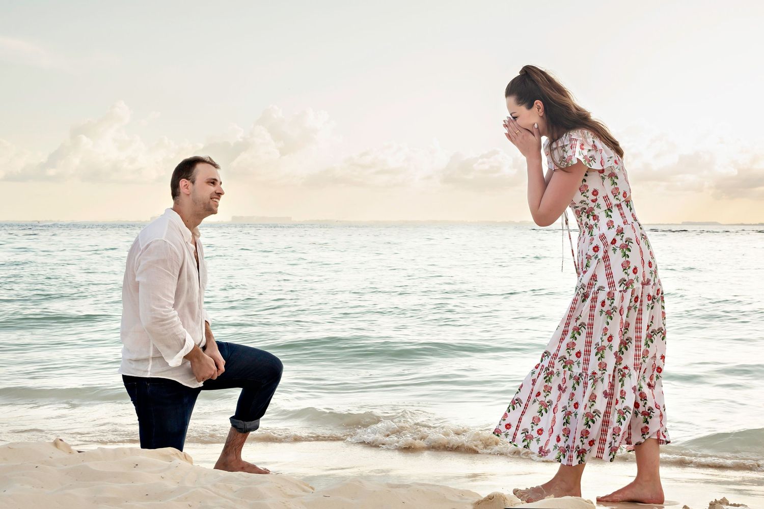 Romantic oceanside photography sequence during sunset on a sandy beach near rolling waves.