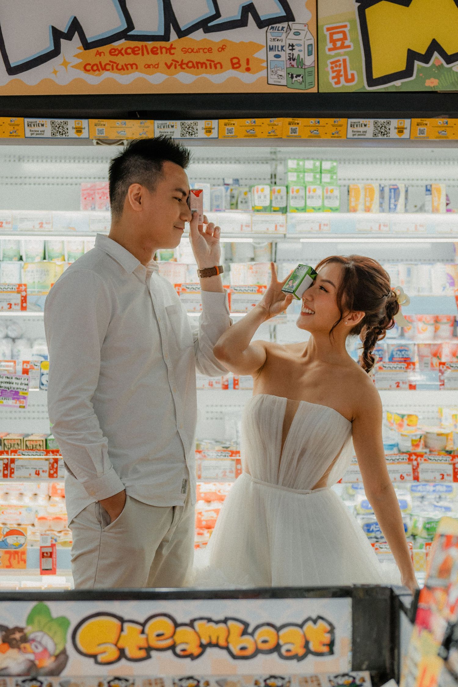 Dancing through the frozen food aisle in formal attire at a grocery store.