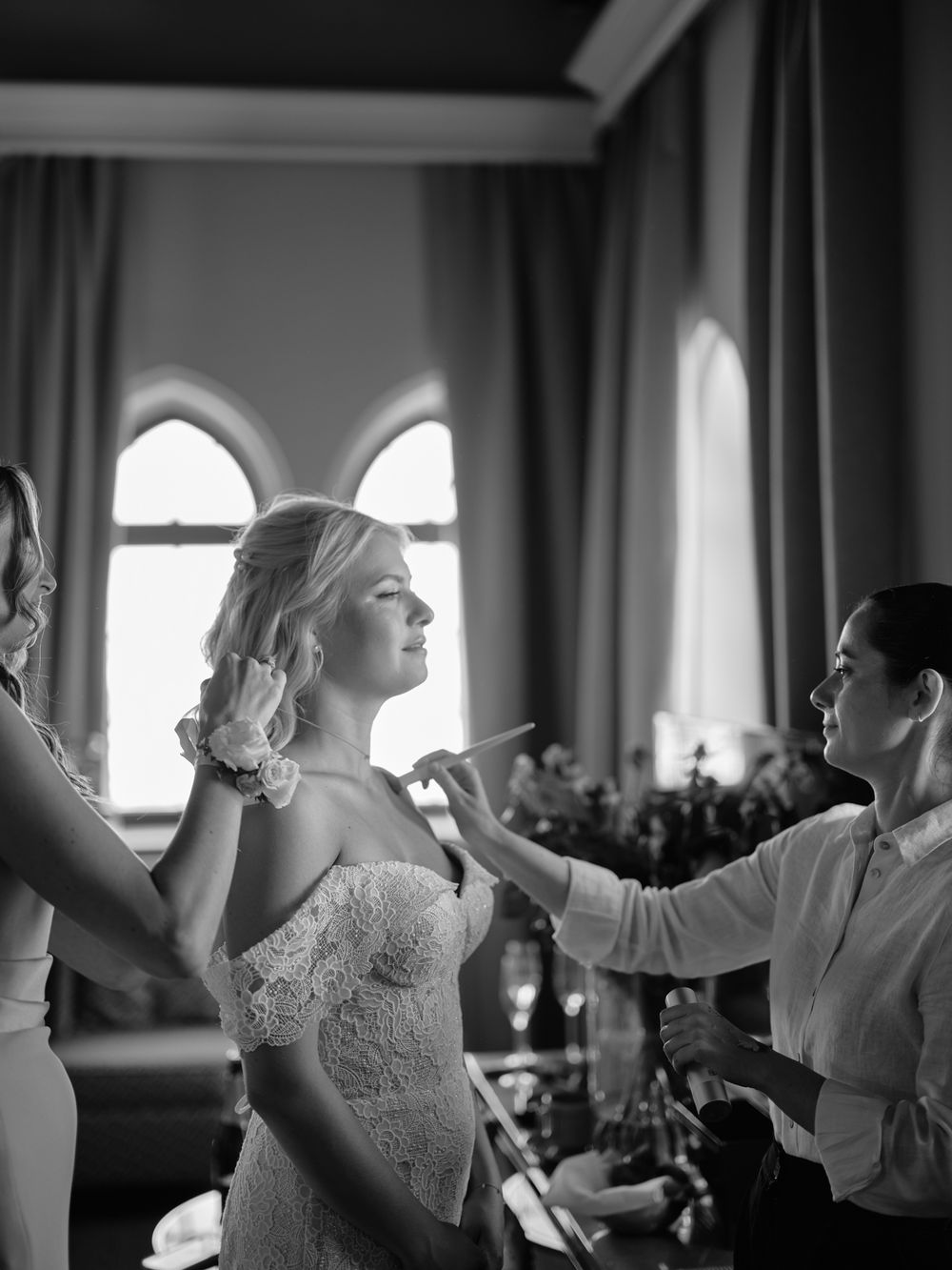 Black and white photos of joyful dancing and celebration at an indoor wedding reception. Photoshoot by Venice Photographer Alina Indi