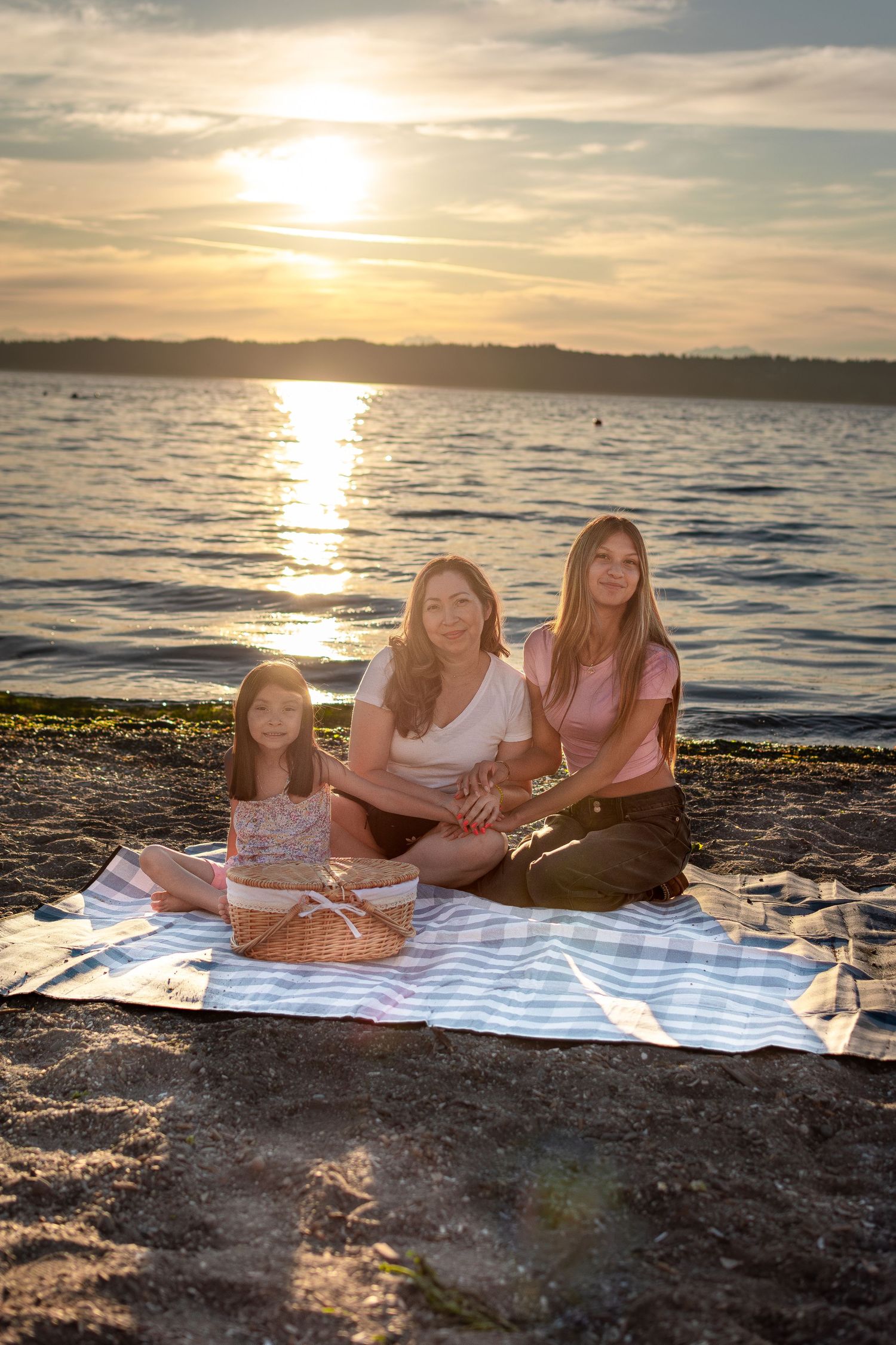 Sunset mommy and me mini session with picnic basket at Des Moines Beach