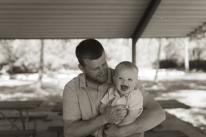 Black and white photo series capturing spontaneous joyful moments between family members.