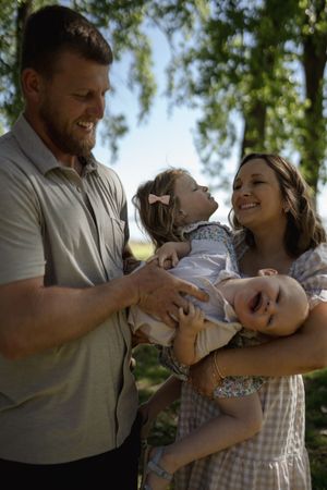 Candid family photography sequence showing playful interactions in natural light.
