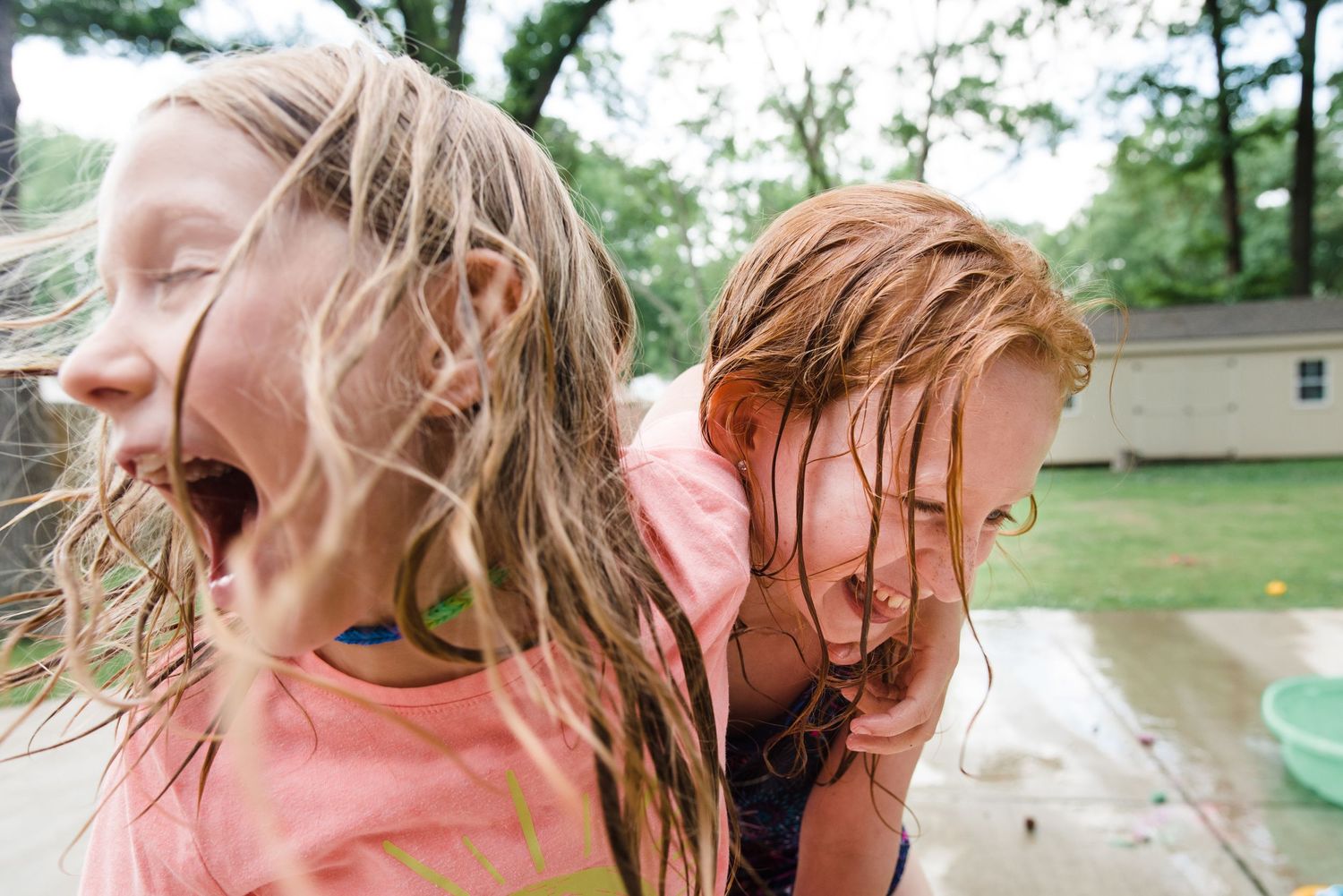 Memphis Family Photographer capturing a Day in the Life Session and the joy of two sisters.