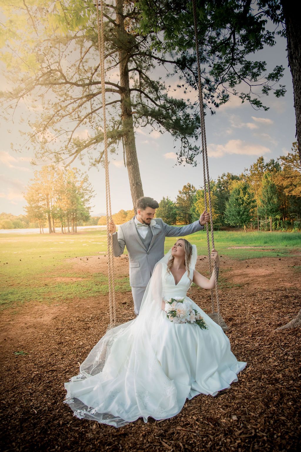 Couple having first dance at wedding reception on shaded patio at Sanctuaire Atelier.