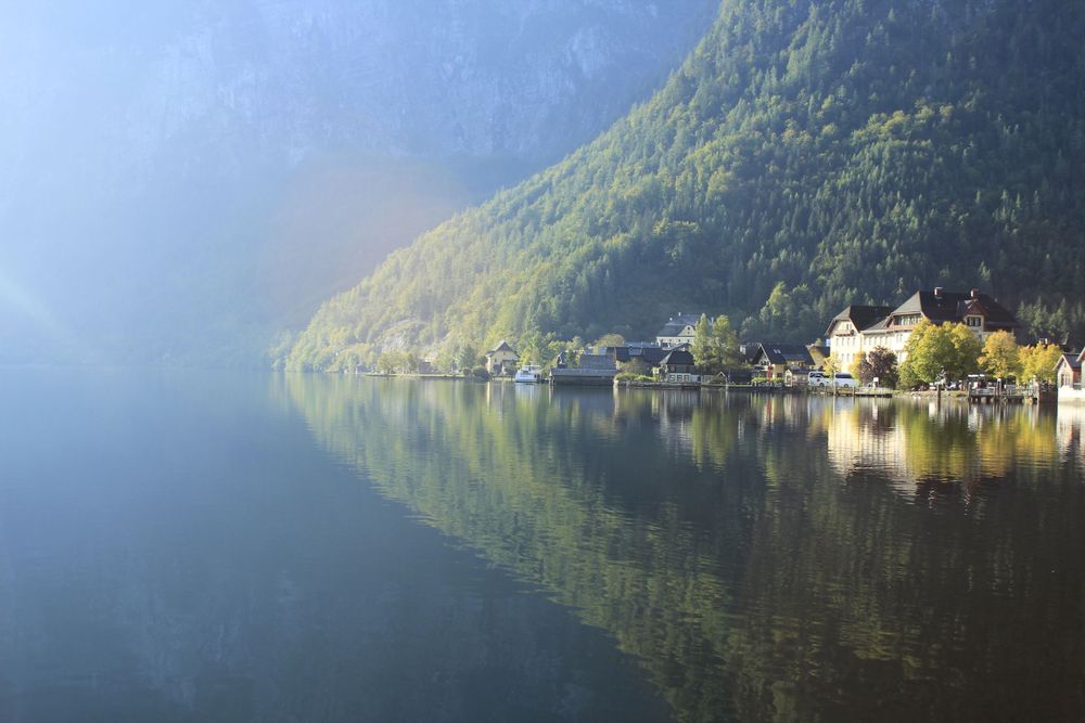 An image of the reflection of a mountain in a lake.