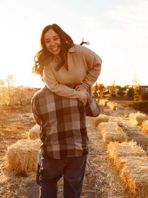 someone carrying their partner over their shoulder