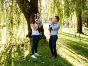 family laughing and playing together