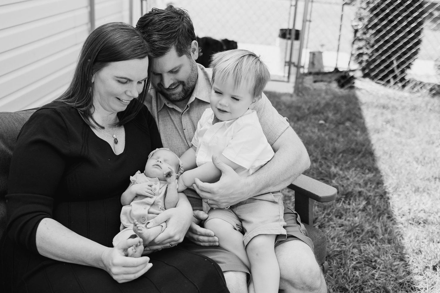 Family spending time together outdoors on a sunny day.