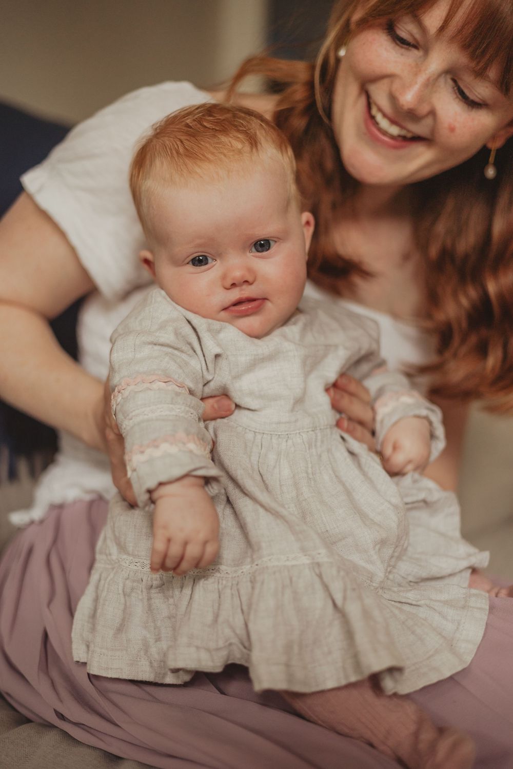 mum sitting with baby