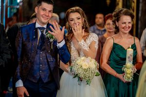 Wedding celebration with guests in formal attire gathered for festivities.