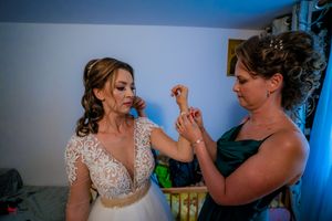 Joyful pre-wedding moments captured during bridal preparations.