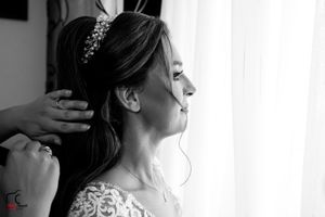 Black and white photo series showing bridal preparation moments.