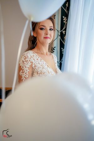 Dreamy bridal portrait series featuring delicate lace details and soft lighting.