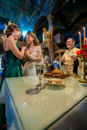 Wedding celebration captured in atmospheric lighting with elegant table settings and decor.