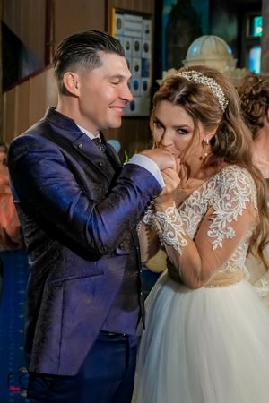 Romantic dance moment captured during an elegant wedding reception.