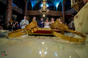Luxurious event space featuring crystal chandeliers and atmospheric blue lighting design.