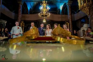 Elegant banquet hall illuminated by ornate chandeliers casting a warm glow over the celebration.