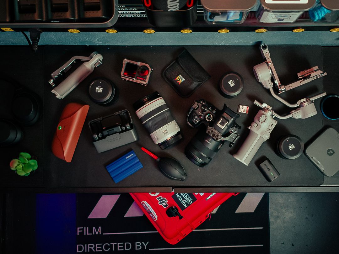 Complete professional photography gear kit — Canon cameras, RF lenses, DJI gimbal, audio, and lighting for cinematic shoots in South Florida