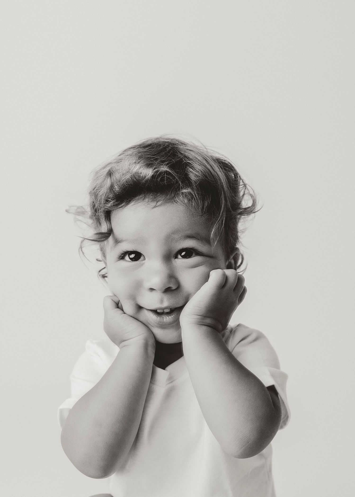 Child personality portrait session in Houston, TX capturing playful expressions, natural light, and authentic childhood moments.