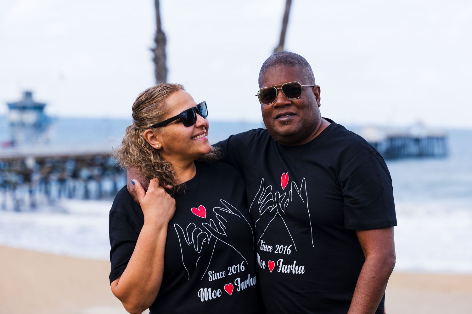 A couple photo where they are wearing matching t-shirts for their 10 year anniversary.