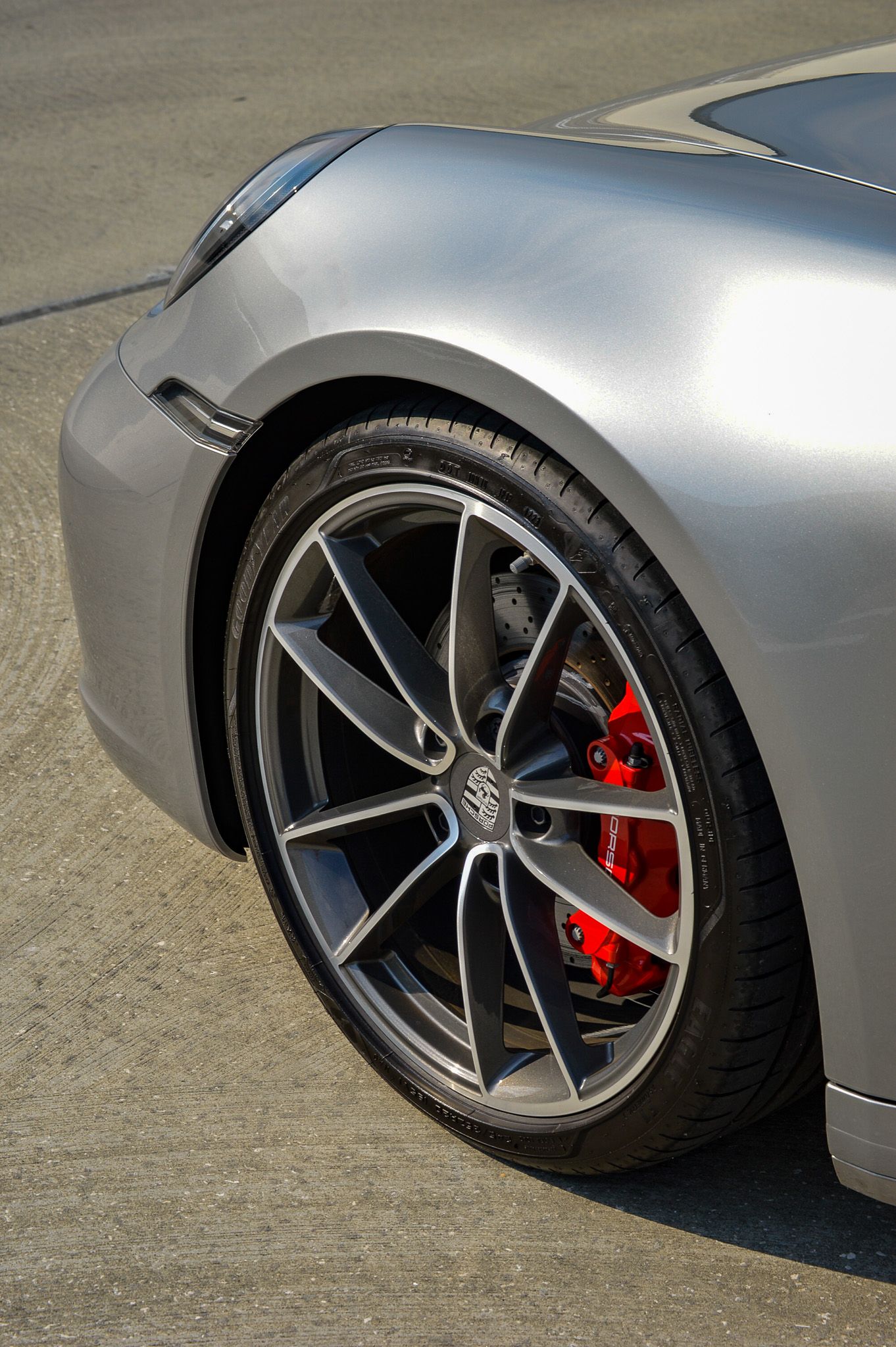 Close up shots of modern car tail lights with sleek LED design elements showing red illumination across multiple angles.
