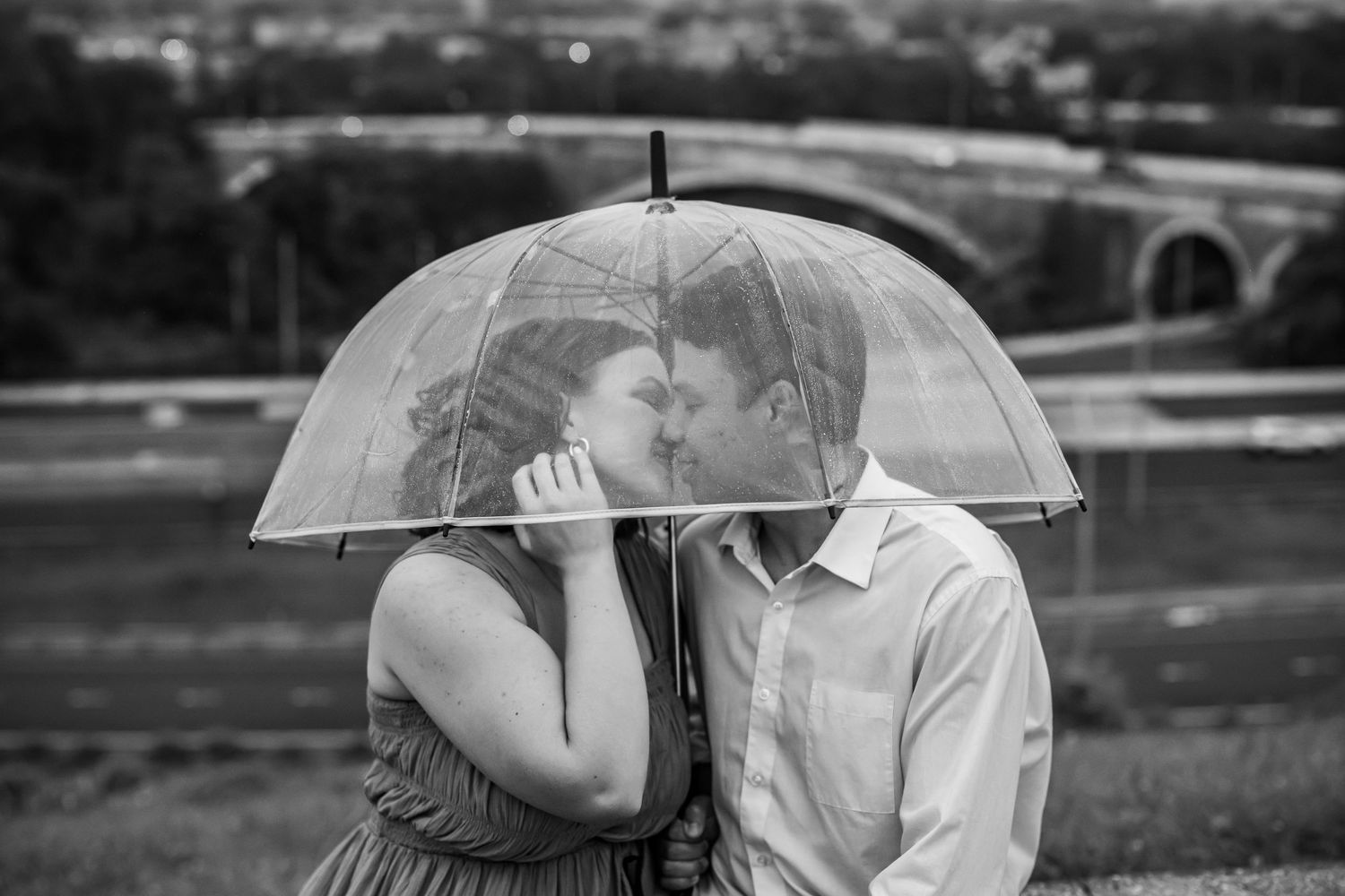 Engagement Session in Druid Hill Park, Baltimore By Daniel Pagan Photography, Black & White picture with a couple and an umbrella.