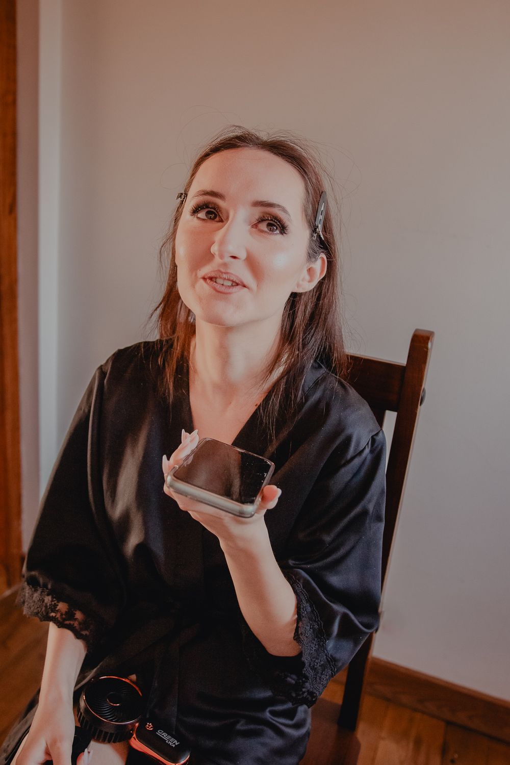 Natural light portrait during wedding day preparations.