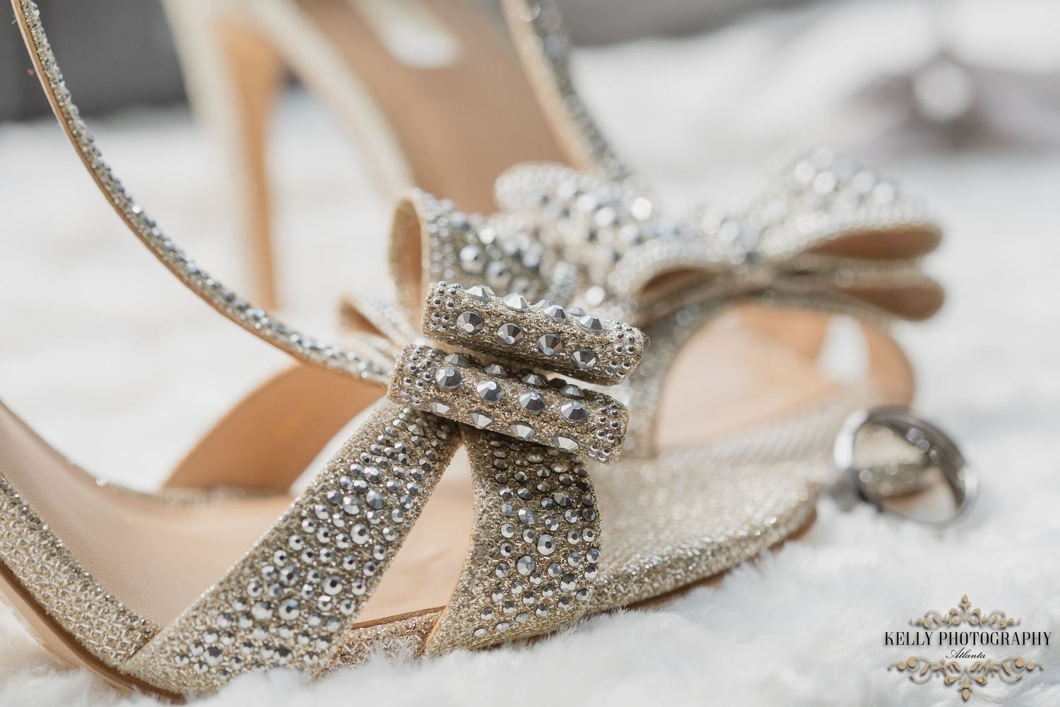 Crystal-embellished bridal shoes with decorative details photographed in soft light.