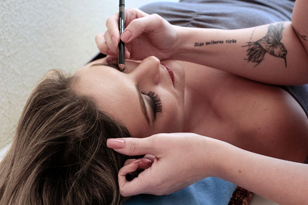 A close-up portrait series shows makeup making of moments with dramatic shadows and lighting effects.