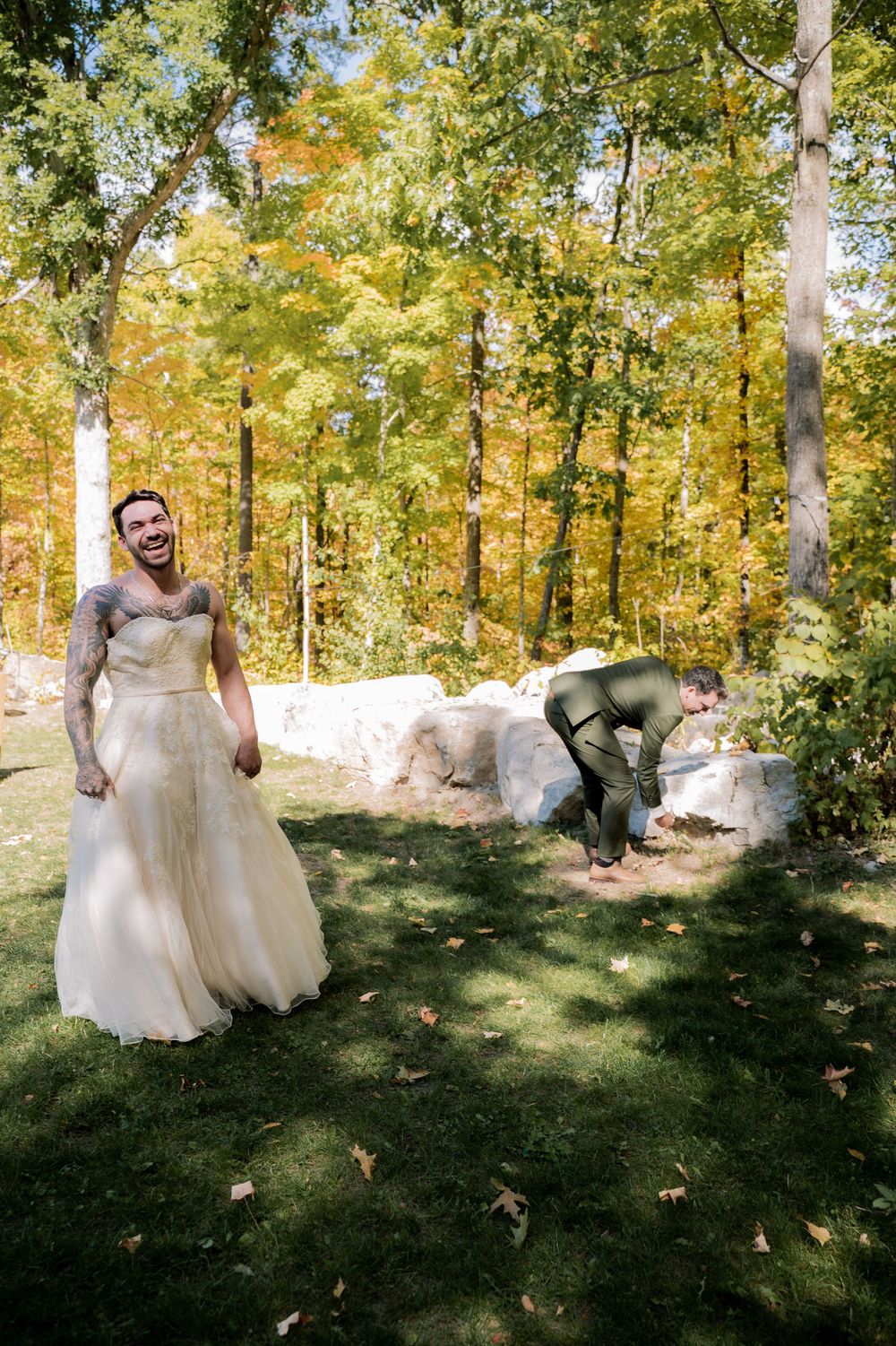 A series of joyful moments captured as newlyweds dance and celebrate among golden autumn trees in a woodland setting.