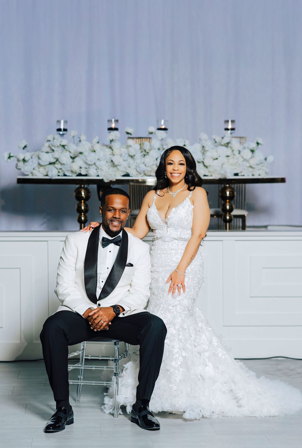 A wedding photo collage showing the couple in formal attire posing against a light gray backdrop with floral decor.