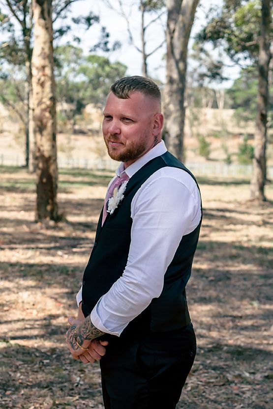 Three sequential photos of a person in formal attire standing in a wooded outdoor setting.