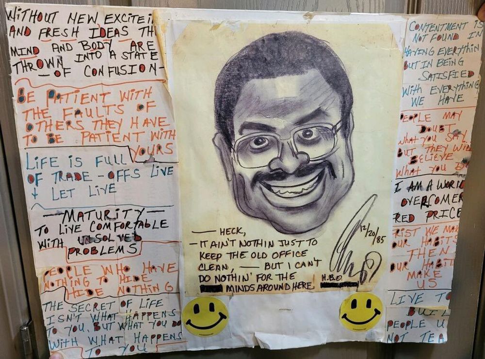 A hand-drawn portrait sketch surrounded by handwritten notes and yellow smiley face decorations.