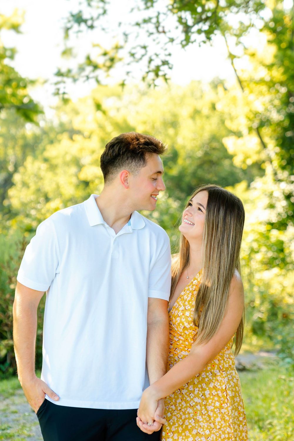 Max proposing to Morgan at Devou Park celebrating at Drees Pavillion:Cincinnati wedding photographer engagement photographer, proposal photo