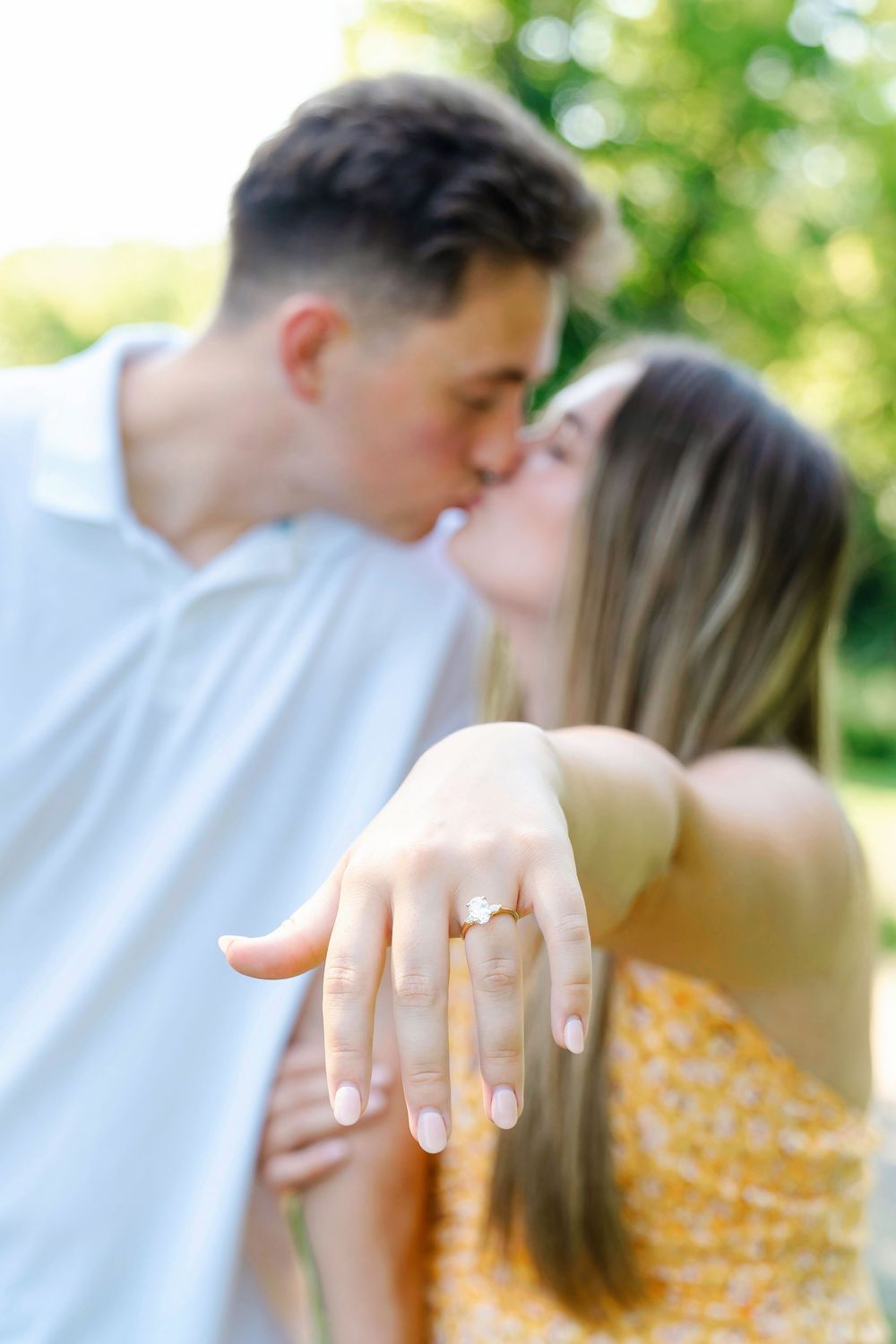 Max proposing to Morgan at Devou Park celebrating at Drees Pavillion:Cincinnati wedding photographer engagement photographer, proposal photo
