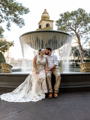 Romantic wedding couple sits by elegant fountain in five artistic shots showing dress train and intimate moments at sunset.