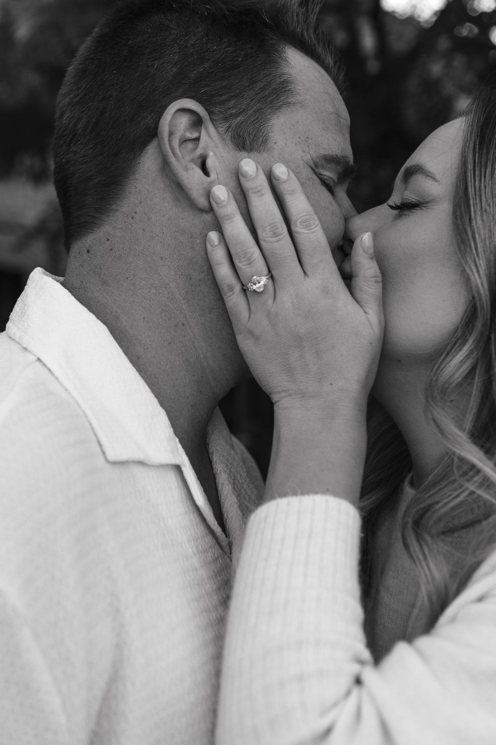 A romantic black and white photo series showing a couple sharing intimate kisses in close-up profile views.